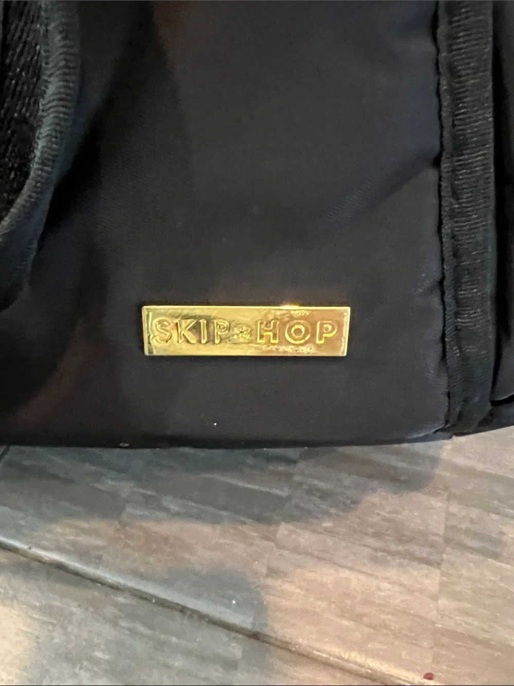 Skip Hop Black Baby Diaper Bag with Gold Zipper Accents